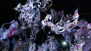 Spooky Art Installation Puts Mesmerizing Video on Moving Sculpture